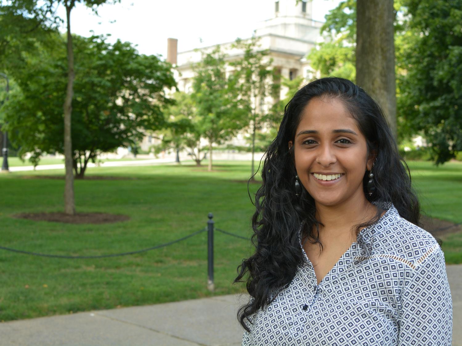Aarthi Madhavan stands outside Old Main