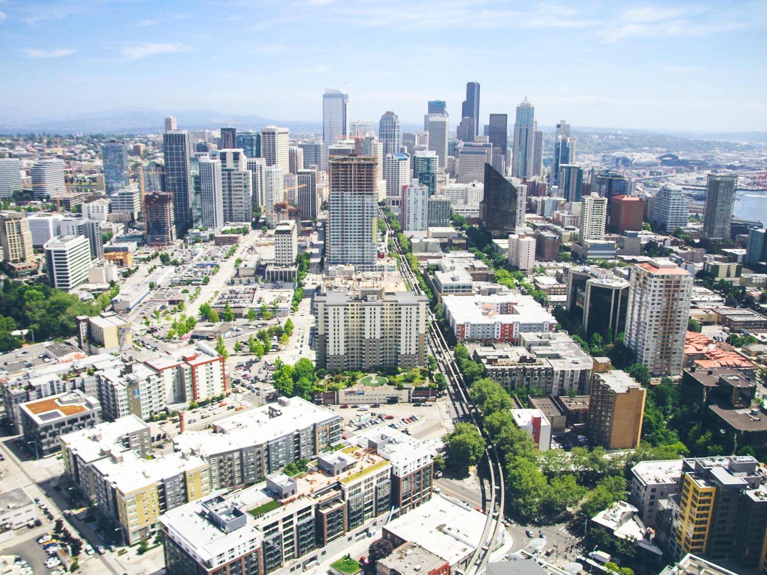 aerial photography of high-rise building under white and blue sky