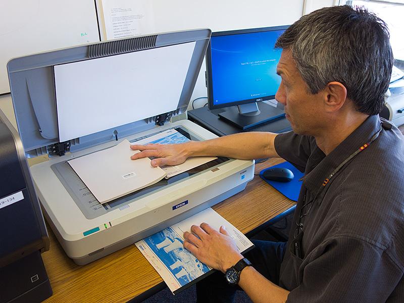 Albert Rozo scans a document