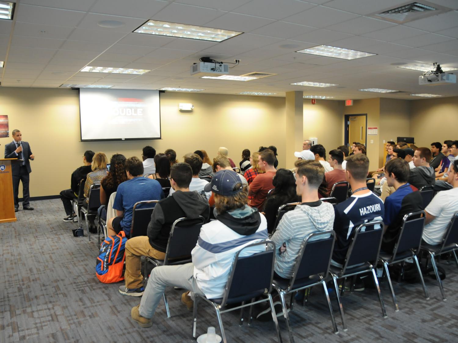 Javier Avila presenting to group