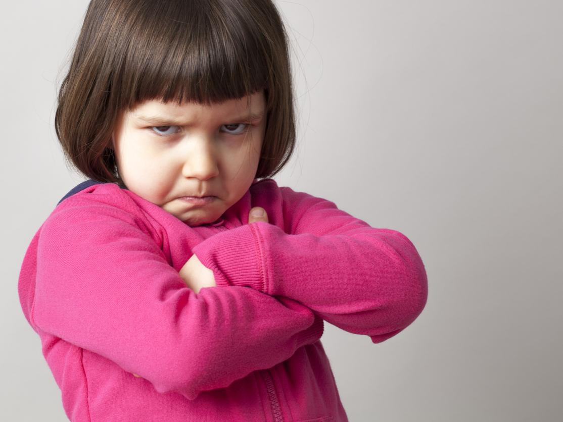 child arms crossed, pouting