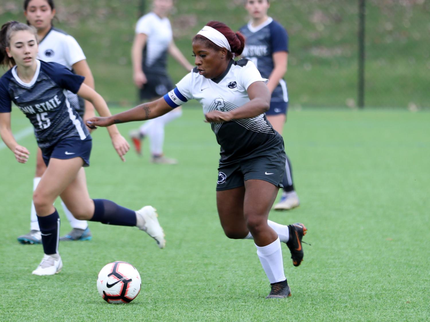Brianna Banks dribbles past a defender