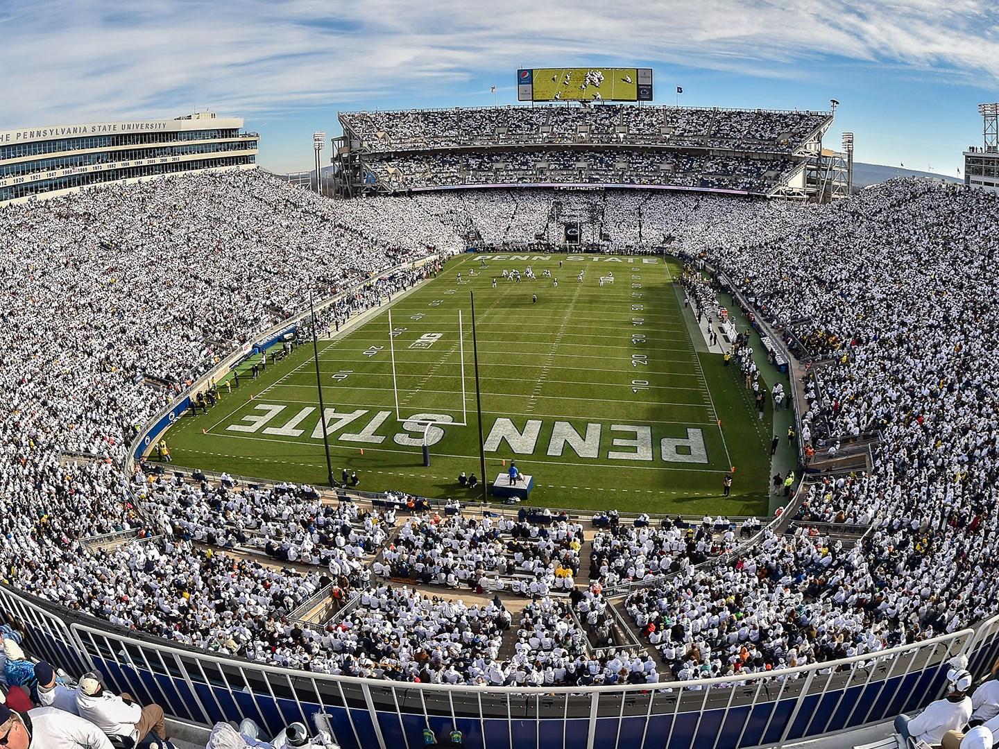 Beaver Stadium filled with football fans in a White Out game