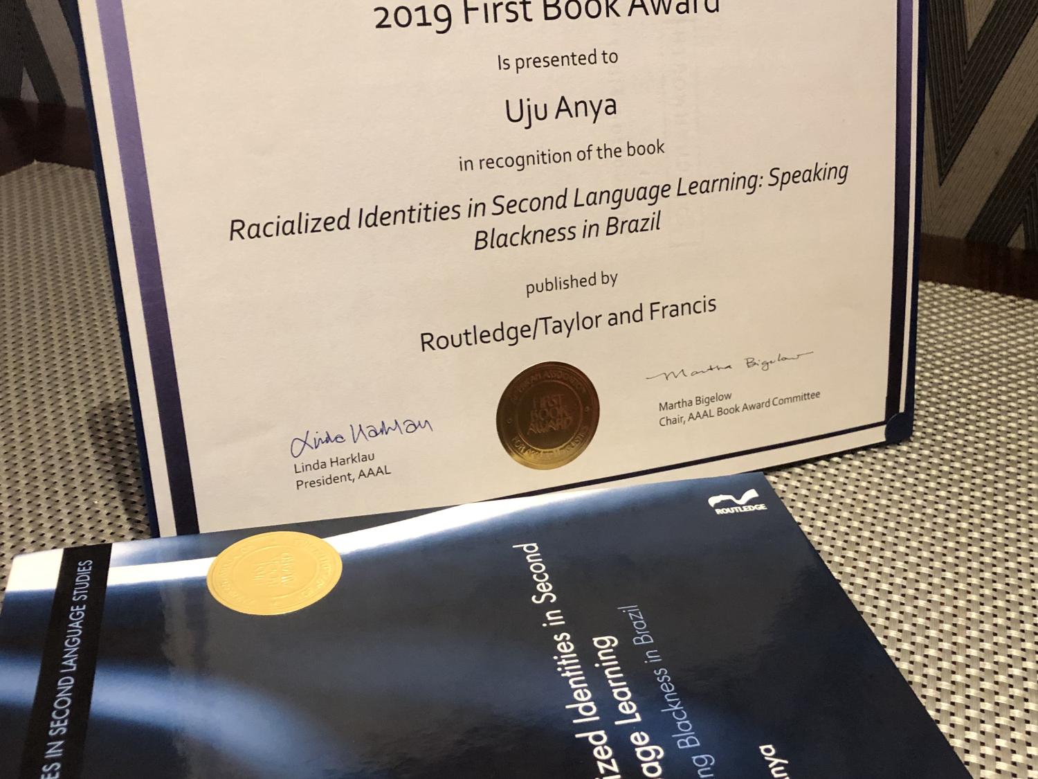 Photo of book and award