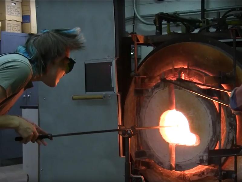 Briana Bennett in glass blowing lab