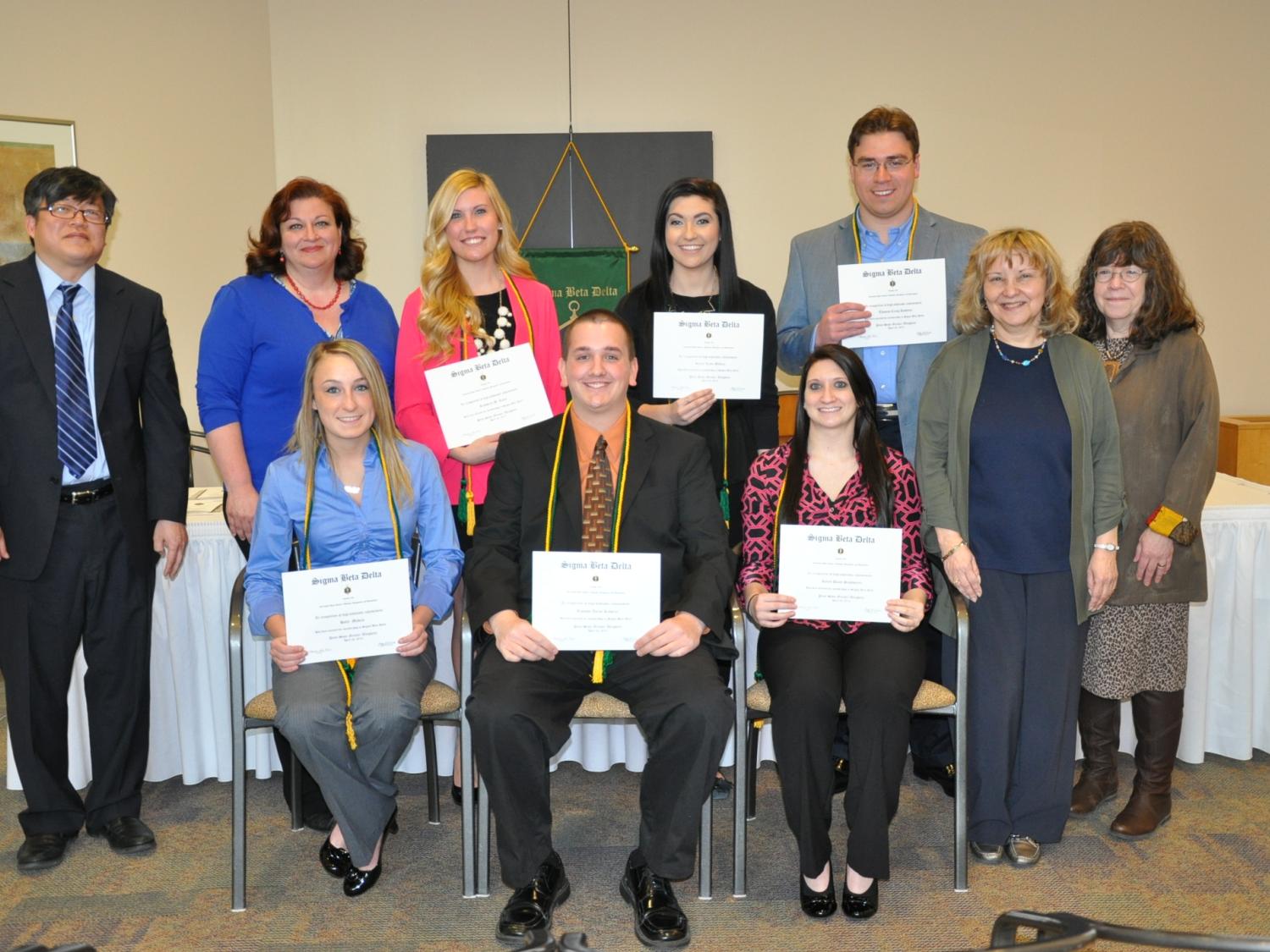 group of students with certificates