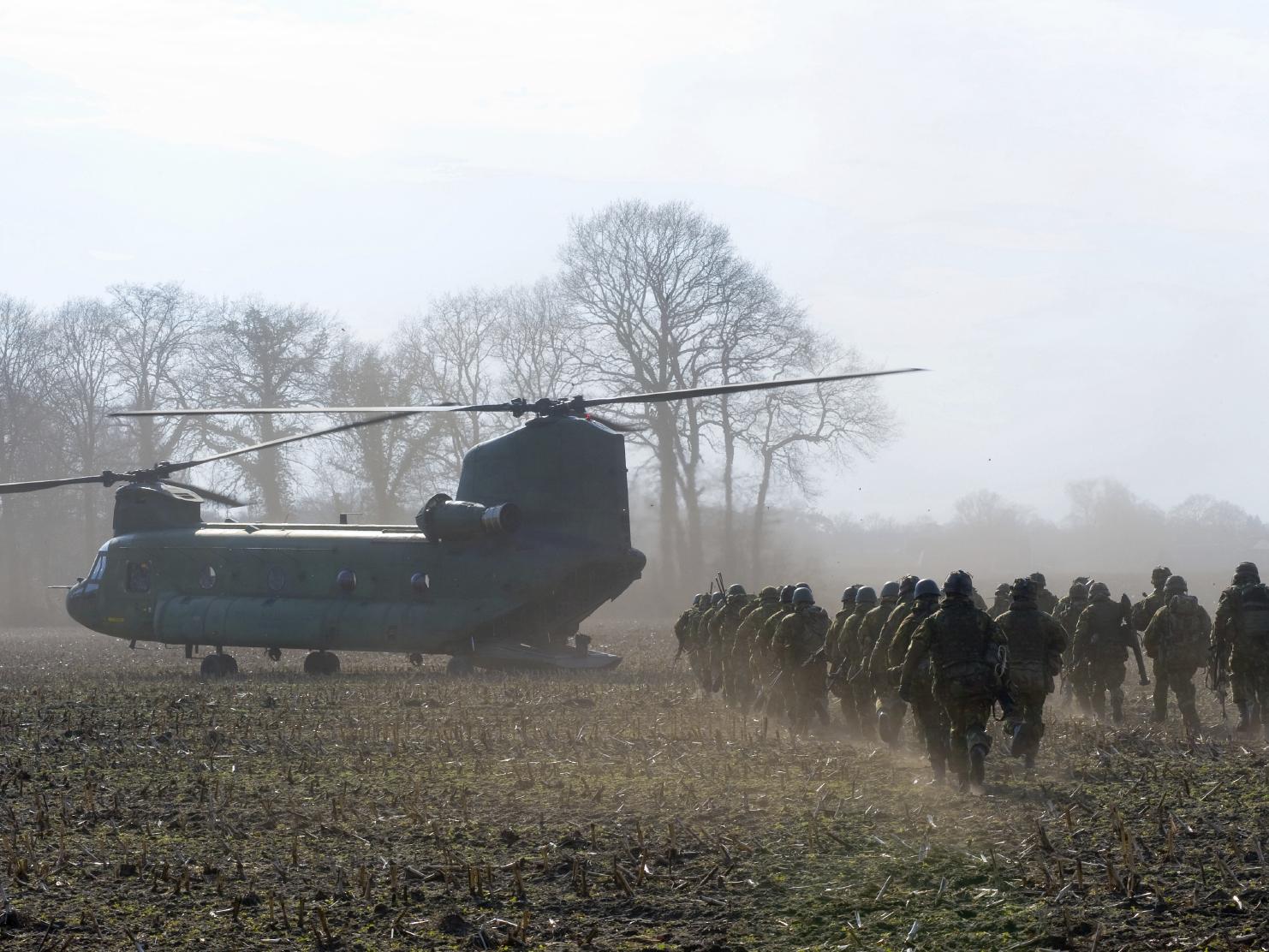 CH-47 Chinook helicopter and troops