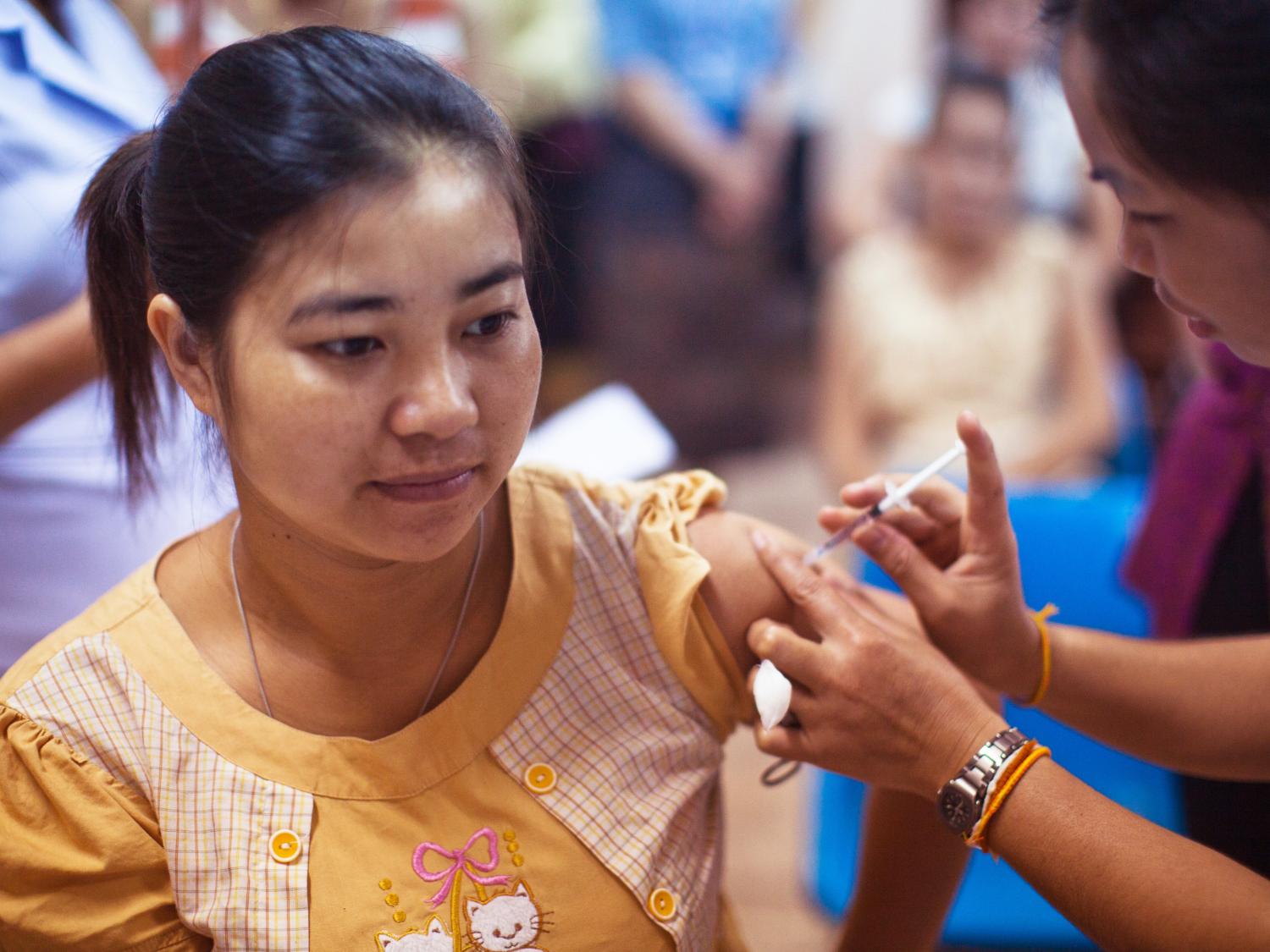 Woman getting vaccine