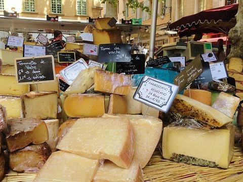 Variety of cheese laid out on a table