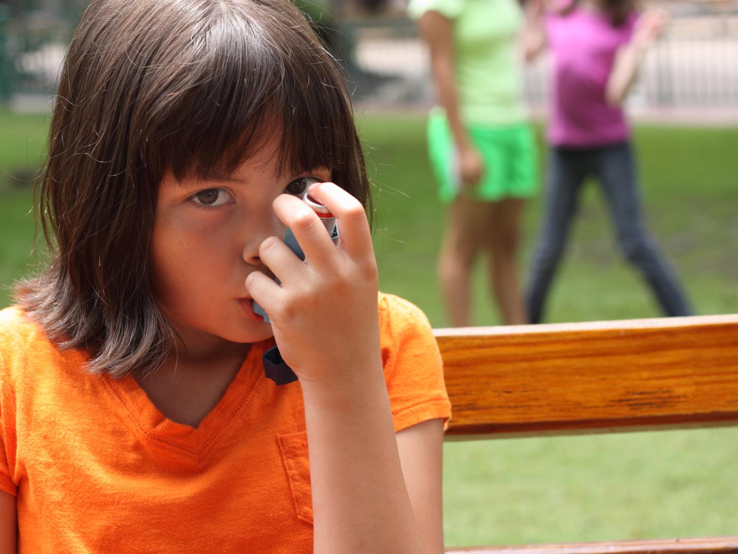 girl on bench, inhaler