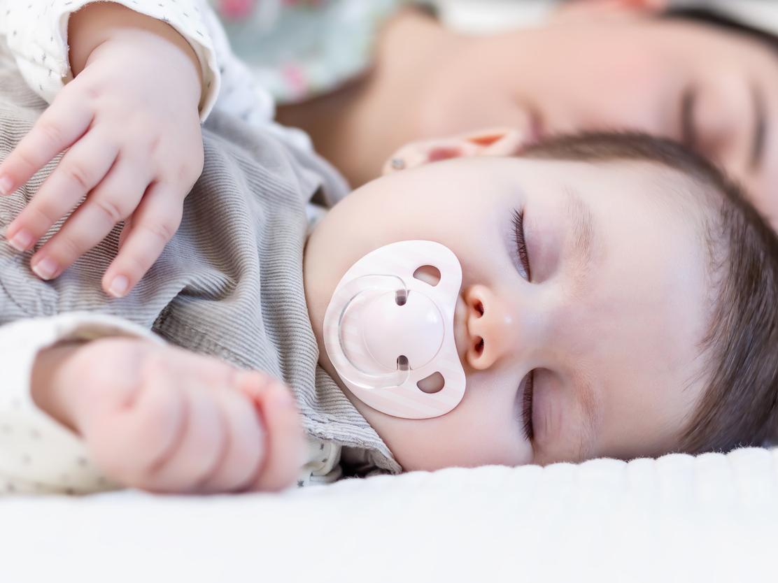 mother, baby sleeping