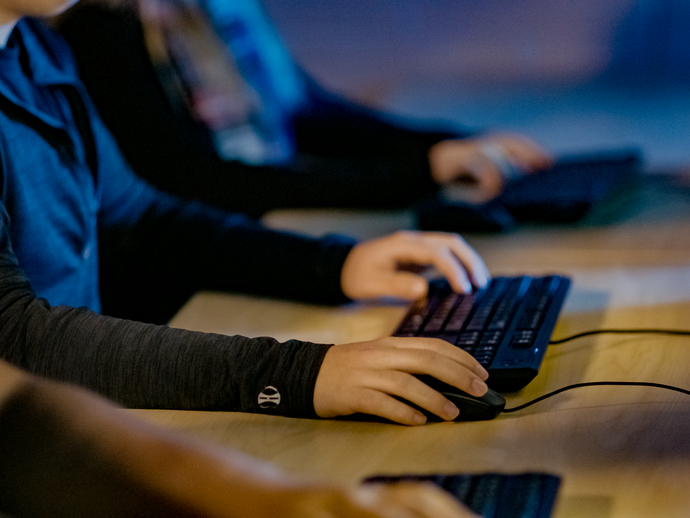 Hands using computer keyboards