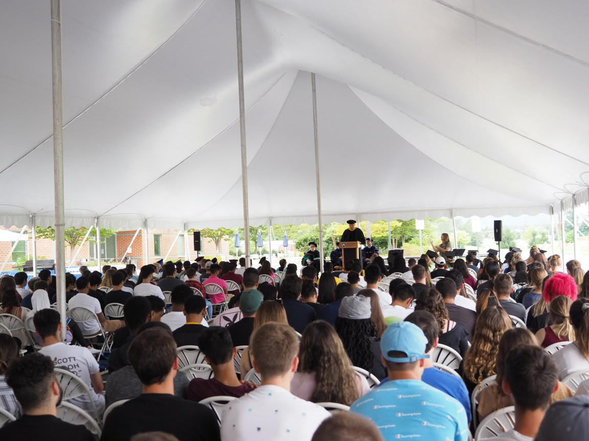 crowd under a tent