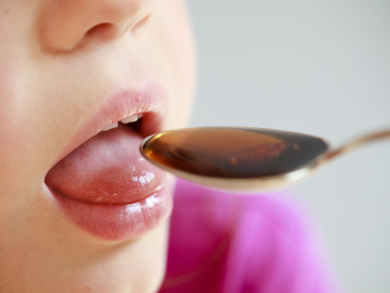 giving child cough syrup