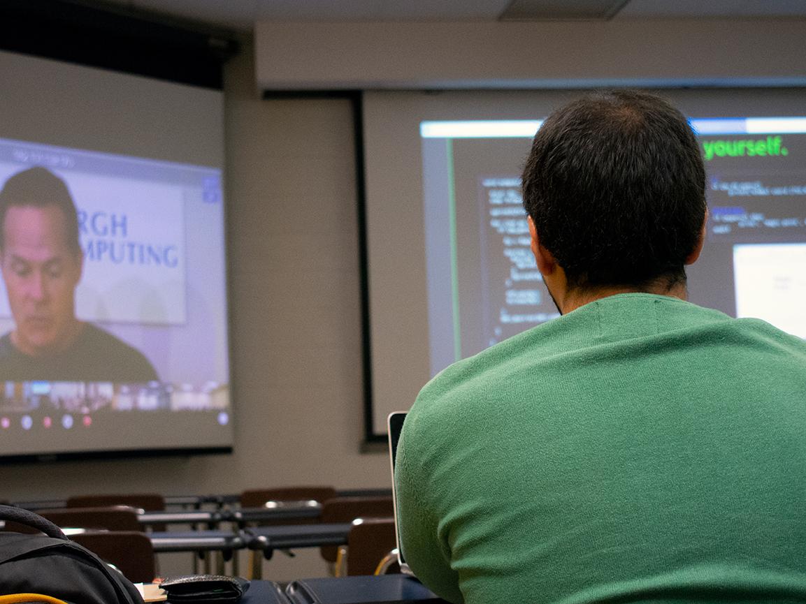 person watching presentation