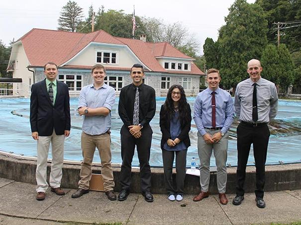 Assistant Professor of Engineering Joseph Ranalli, James Dotzel, Steven Principe, Cassandra Kelly, Justin Shimko and Assistant Professor of Engineering William Yourey stand in front of Bellefonte's historic Big Spring.