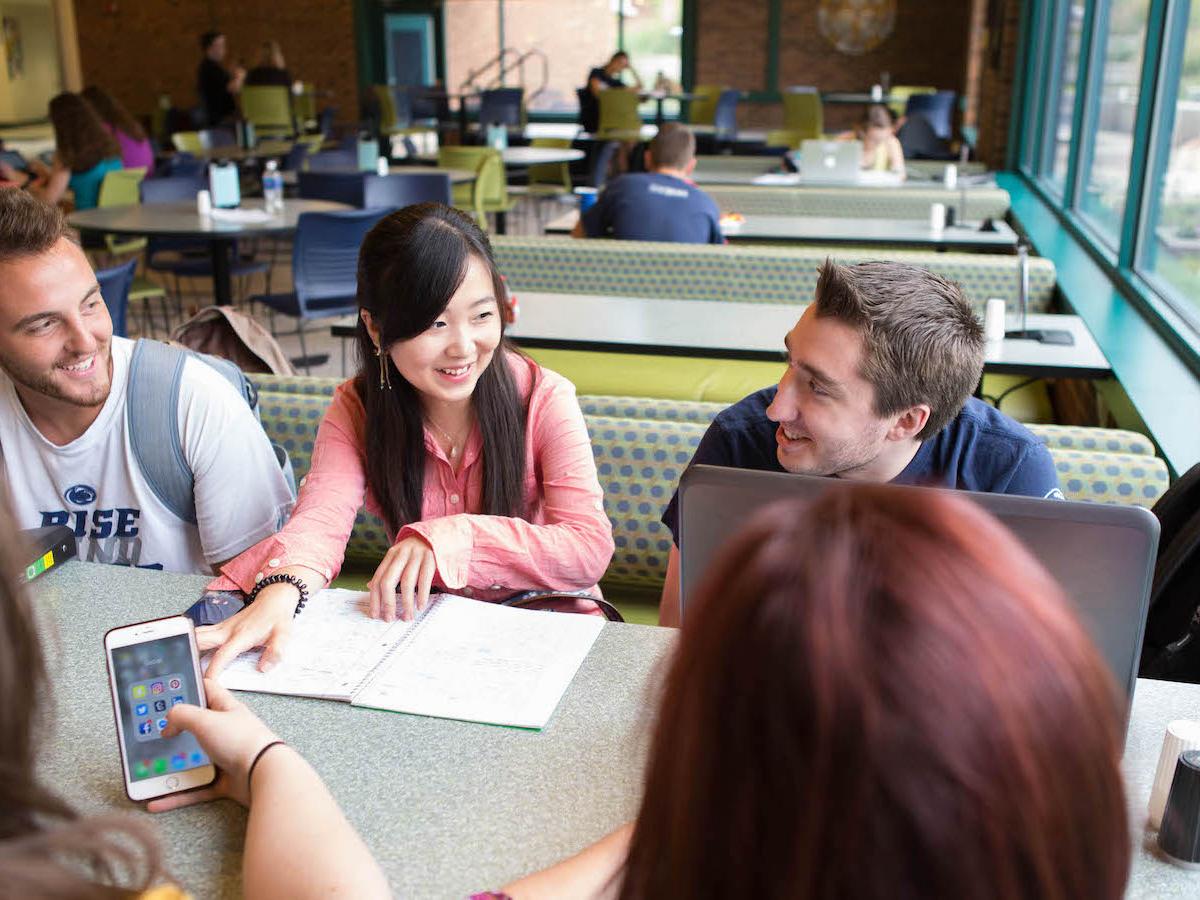 Eva Zhou sits with classmates in the Bistro.
