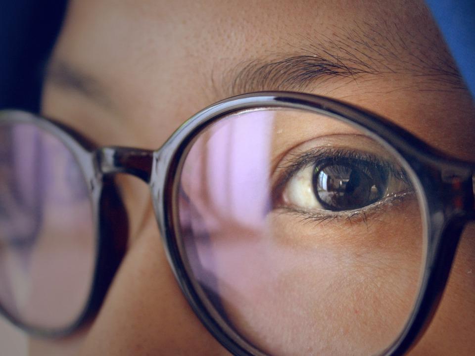 woman with glasses and hijab