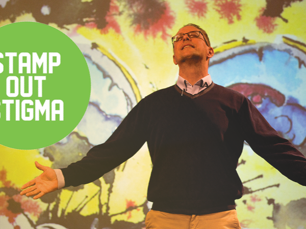 William Doan with Stamp Out Stigma logo