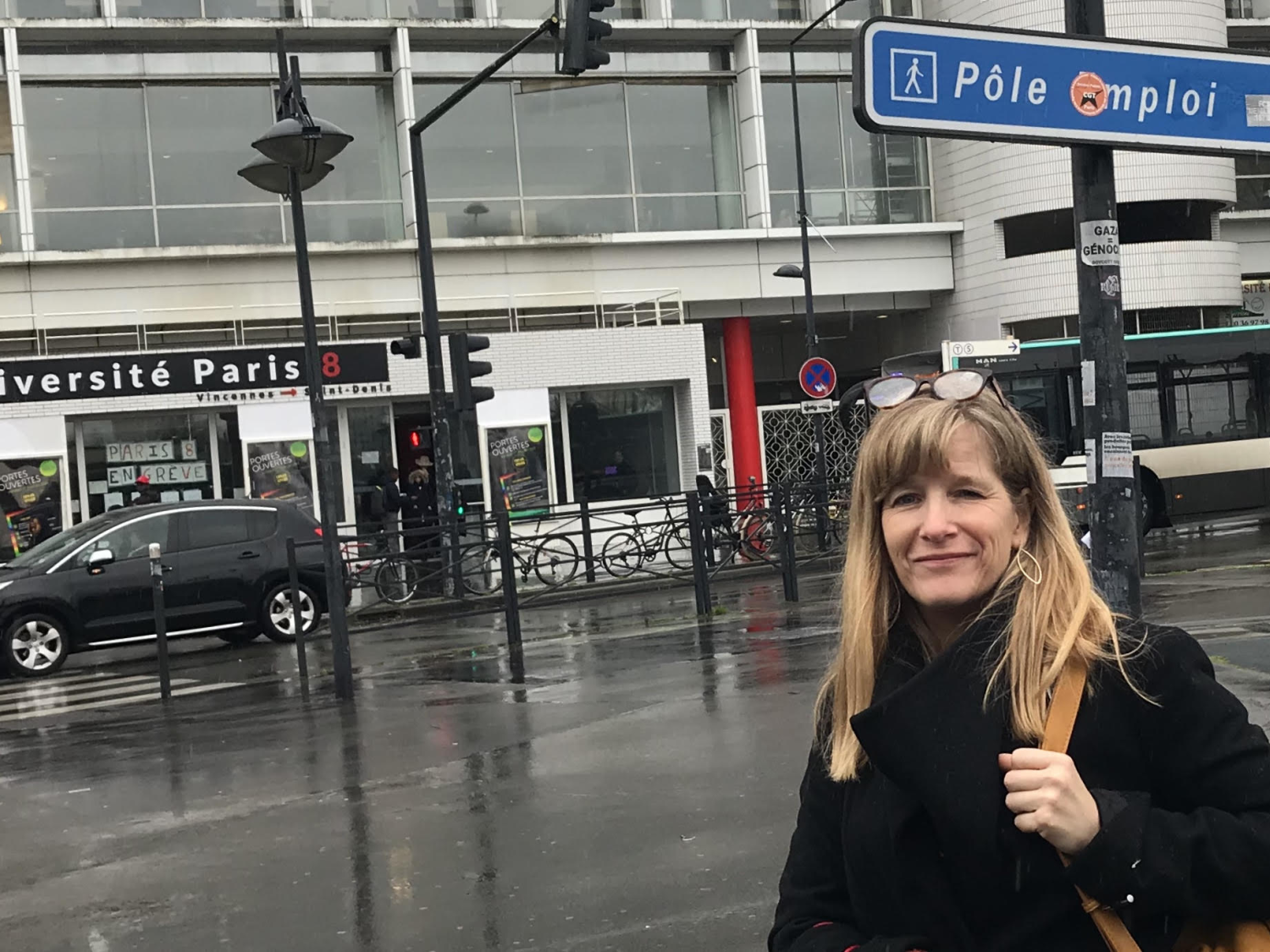 woman in front of a university in Paris, France