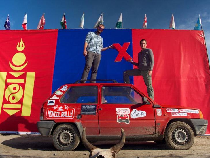 Steve Garguilo and Nate Mook reach the finish line of their Mongol Rally journey in Ulaanbaatar, Mongolia. 