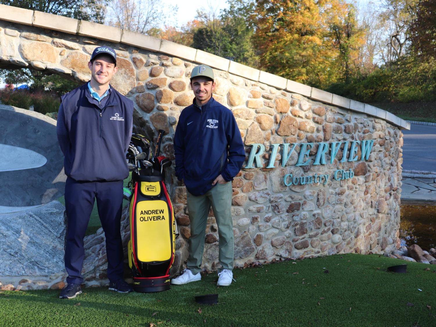 Two men outside country club wall