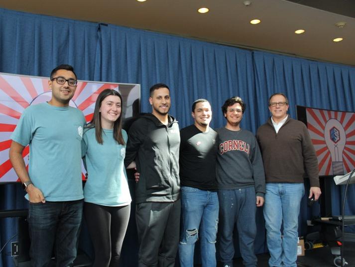 Mayank Makwana, HackPSU co-executive director; Kelsie McElroy, HackPSU co-executive director; Gabriel Ynoa; Josiel Delgadillo; Nicolas Salomon and Michael Kubit, Penn State vice president for information technology and chief information officer.