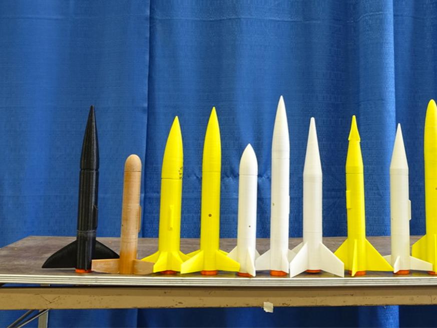 3D printed rockets on table