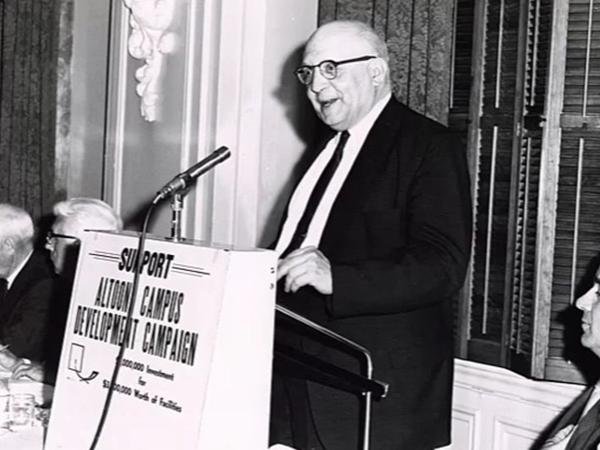 Ted Holtzinger at a podium advocating for Penn State Altoona