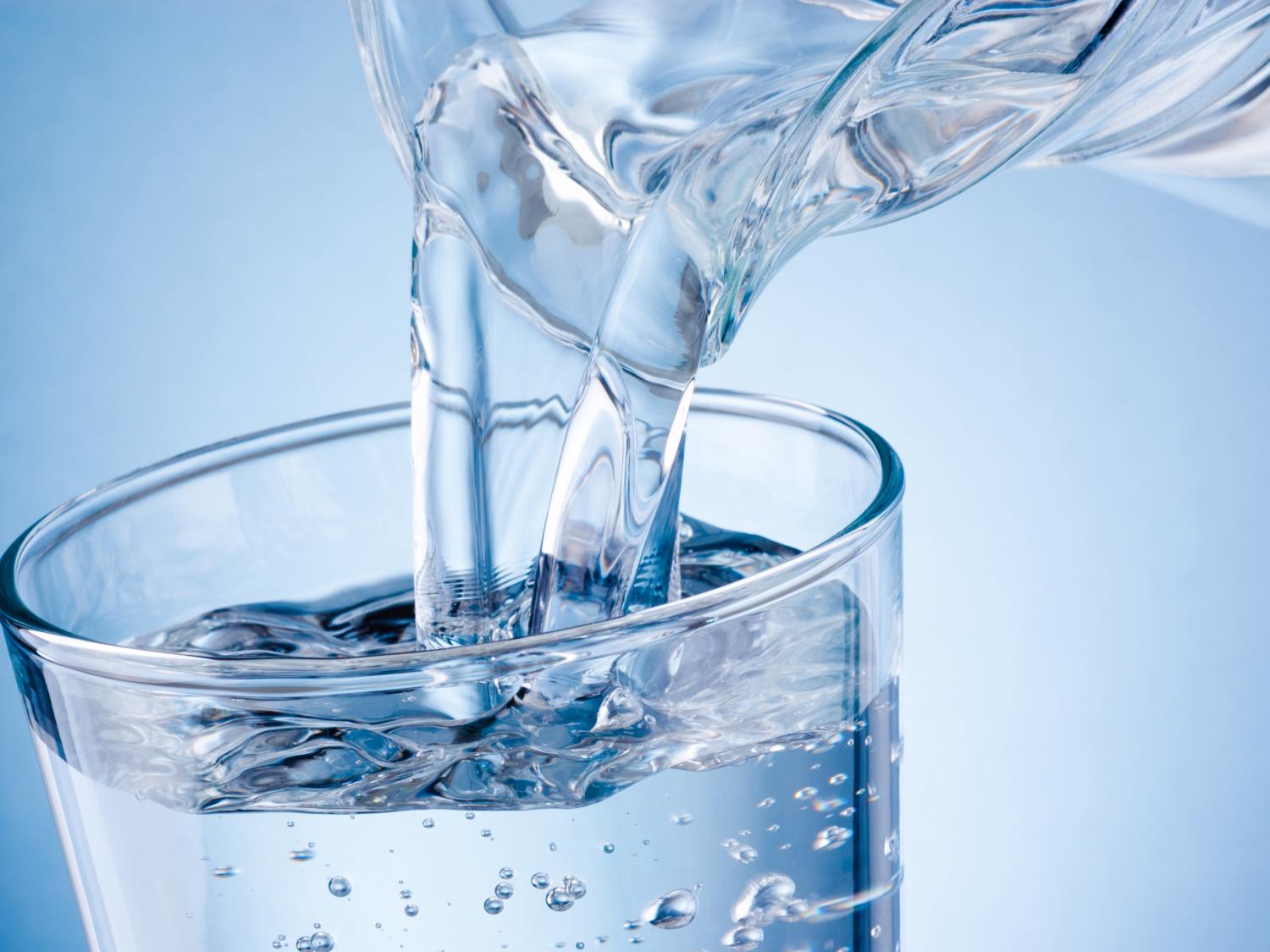Image of clear water being poured into a glass