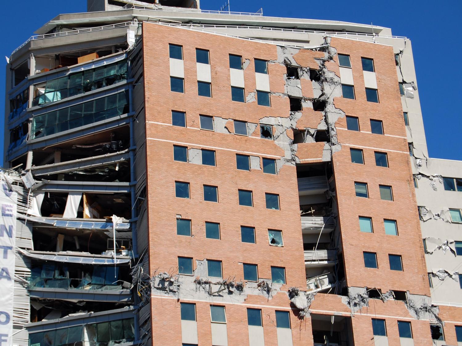 photo of building hit by earthquake