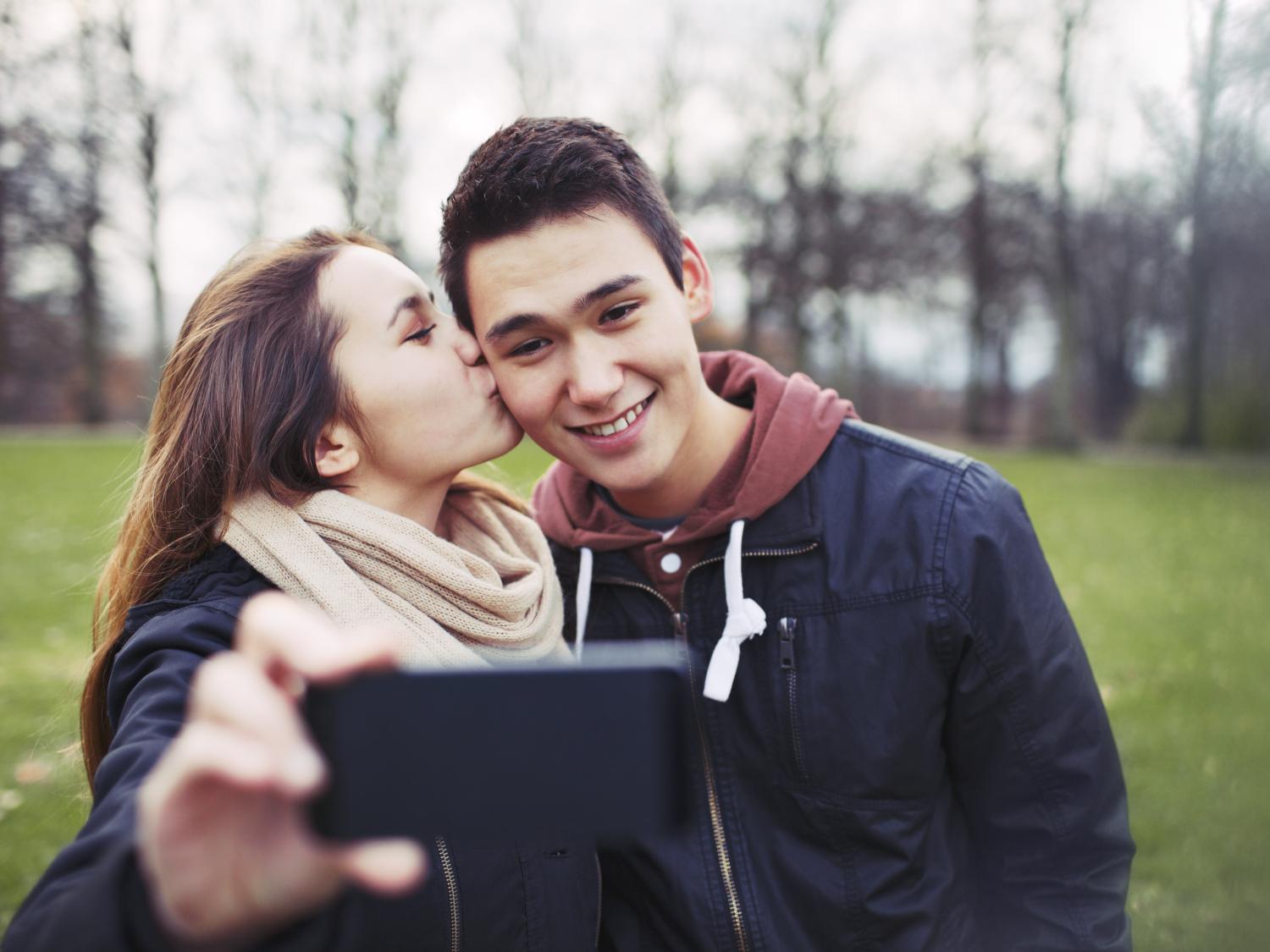 a couple taking a selfie