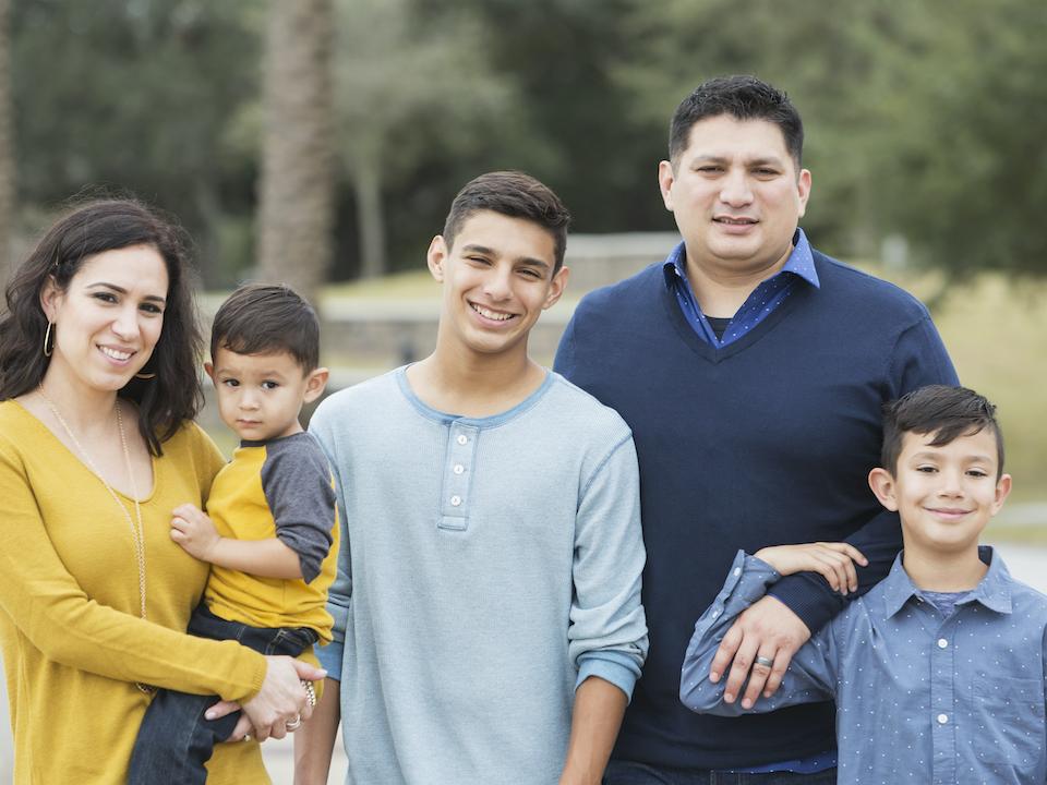 Hispanic family with three boys