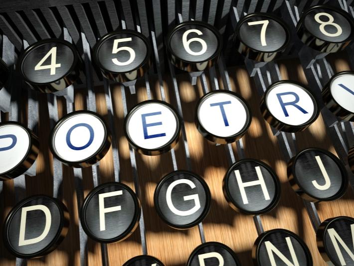 typewriter with POETRY keys