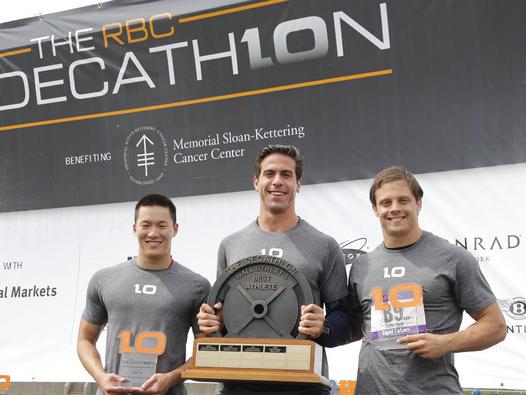 Mark Rubin after the Wall Street Decathlon with the second- and third-place winners
