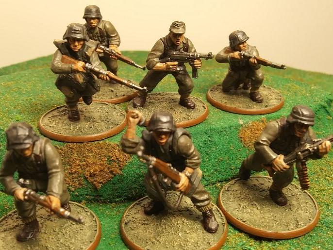 A close-up photo of a band of miniature soldiers.