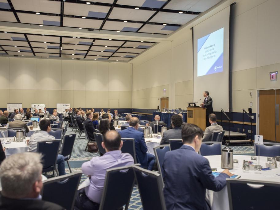 Justin Schwartz giving the welcome address at industryXchange