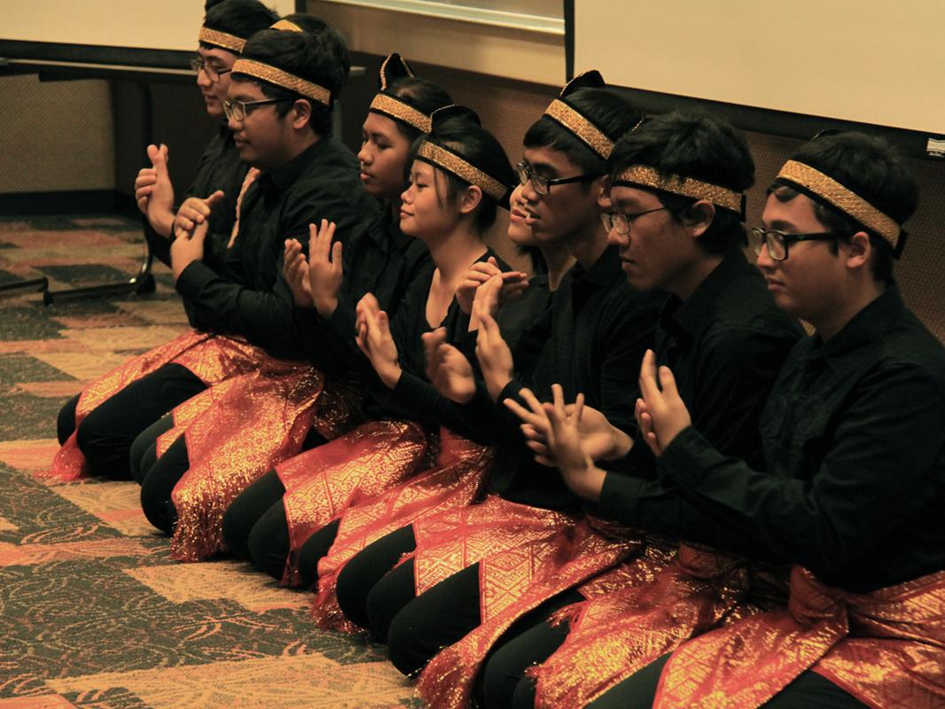 students performing cultural activity