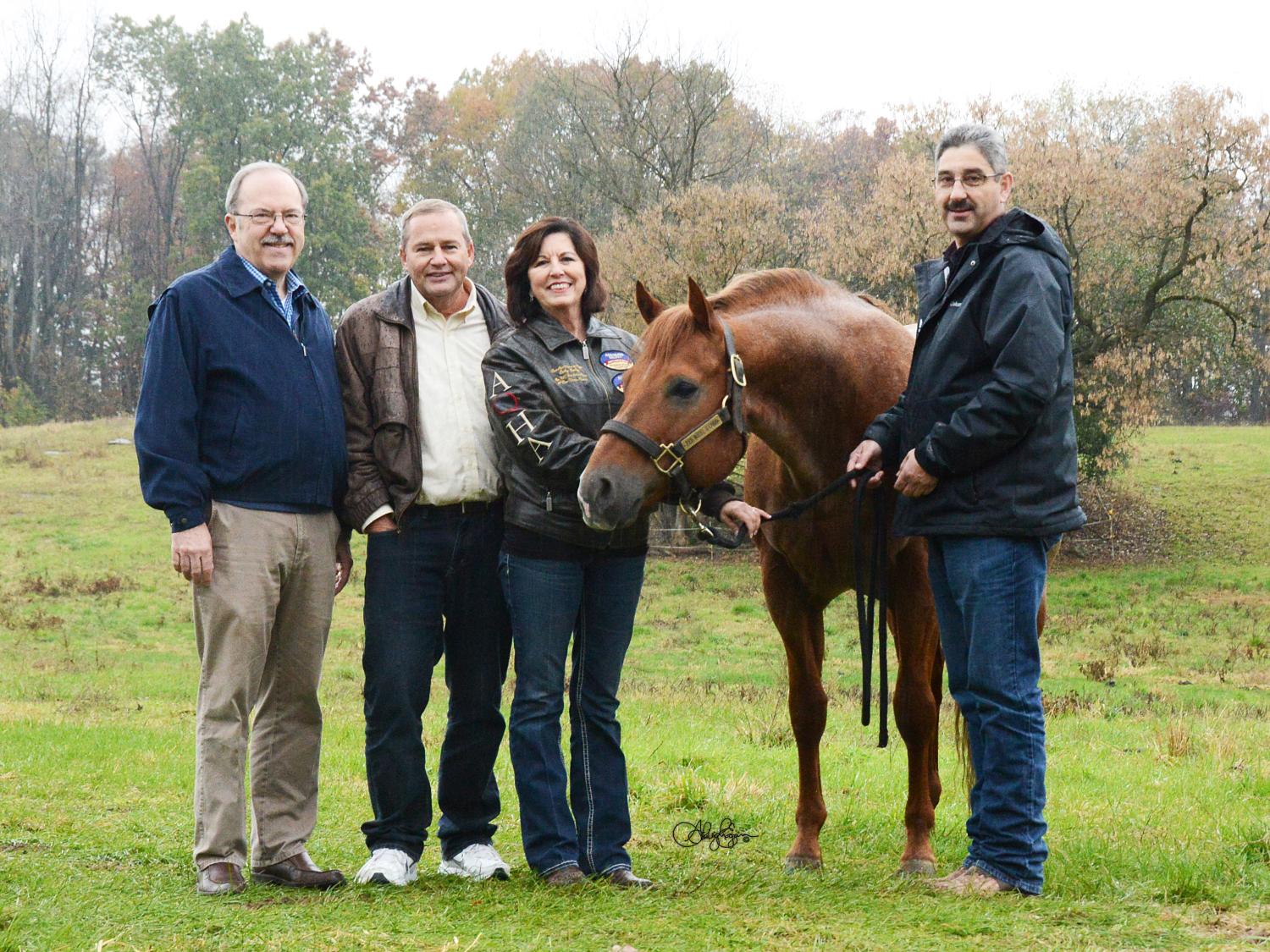 Stallion Red, White N Good standing with Craig and Becky Bailey and Brian Egan