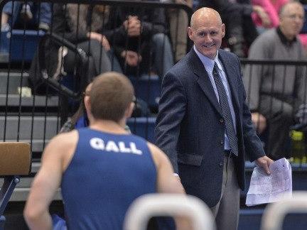 Penn State men's gymnastics coach Randy Jepson with gymnast Preston Gall in the foreground