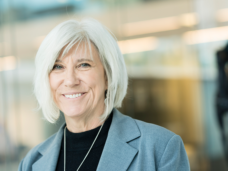Joan B. Rose smiling
