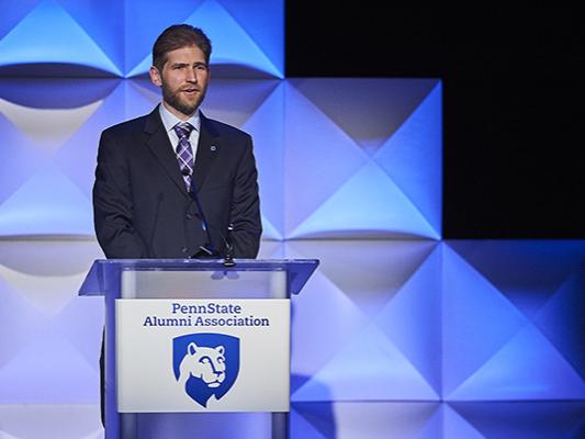 Penn State graduate Daniel Lentz accepts a 2019 Penn State Alumni Association Alumni Achievement Award 