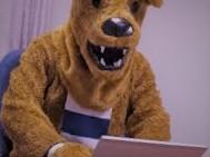 Nittany Lion using laptop