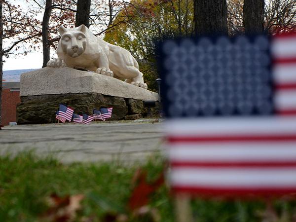 Penn State Altoona Lion Shrine with U.S. Flags
