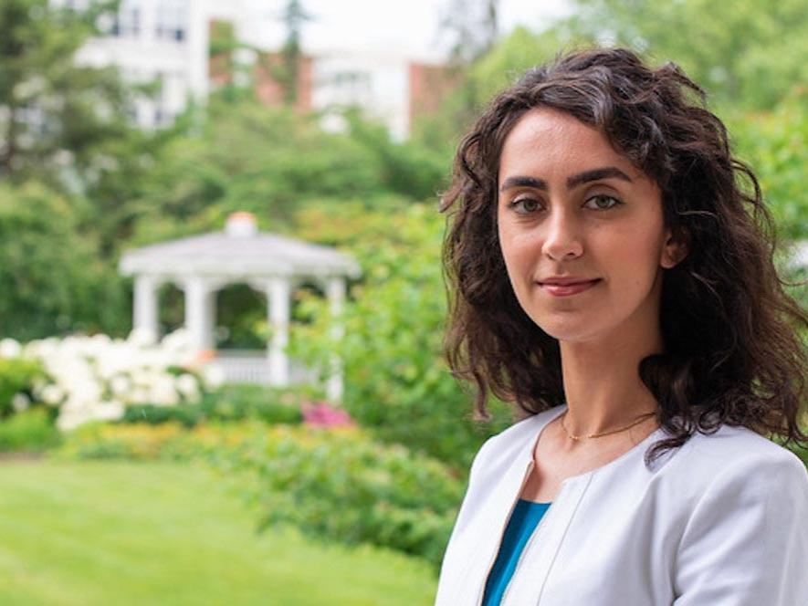 woman in business attire posing for professional headshot