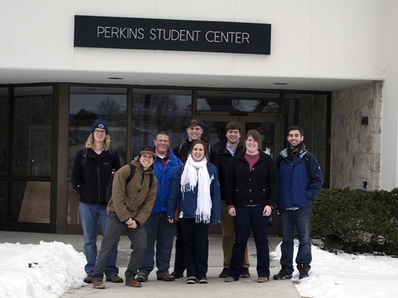 Members of the NECA Penn State student chapter stand in front of the Perkins Student Center at Penn State Berks. 