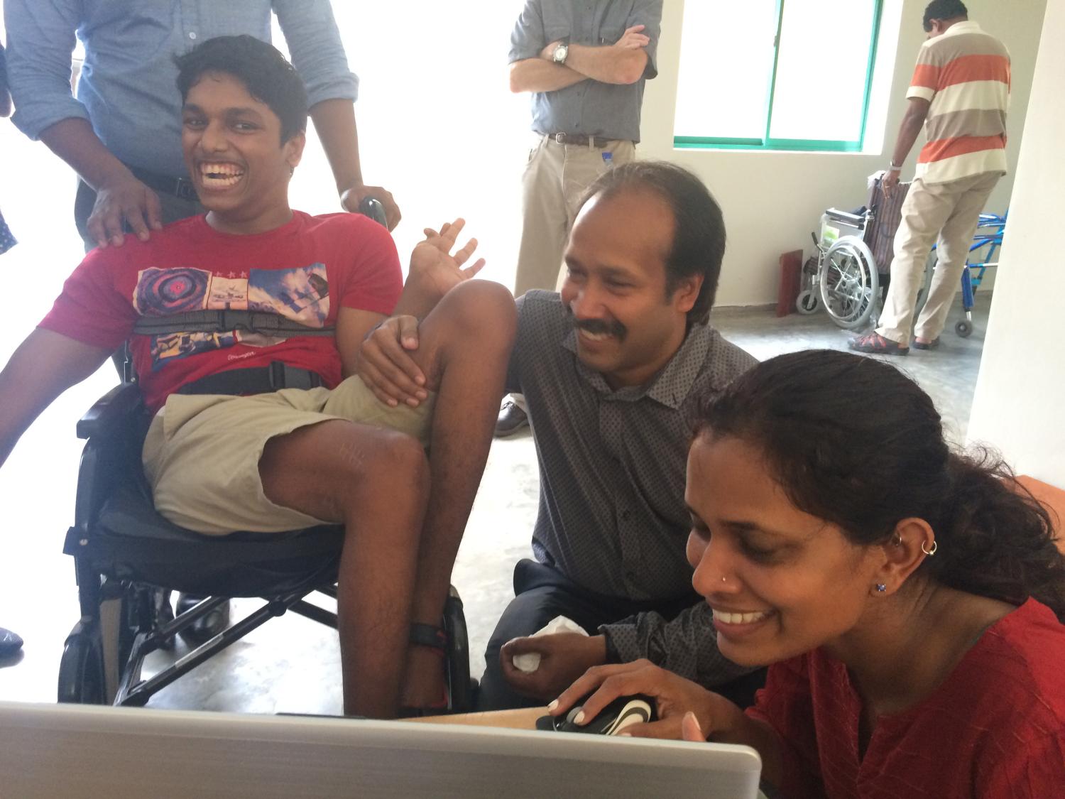 Alumna with student and father in Sri Lanka