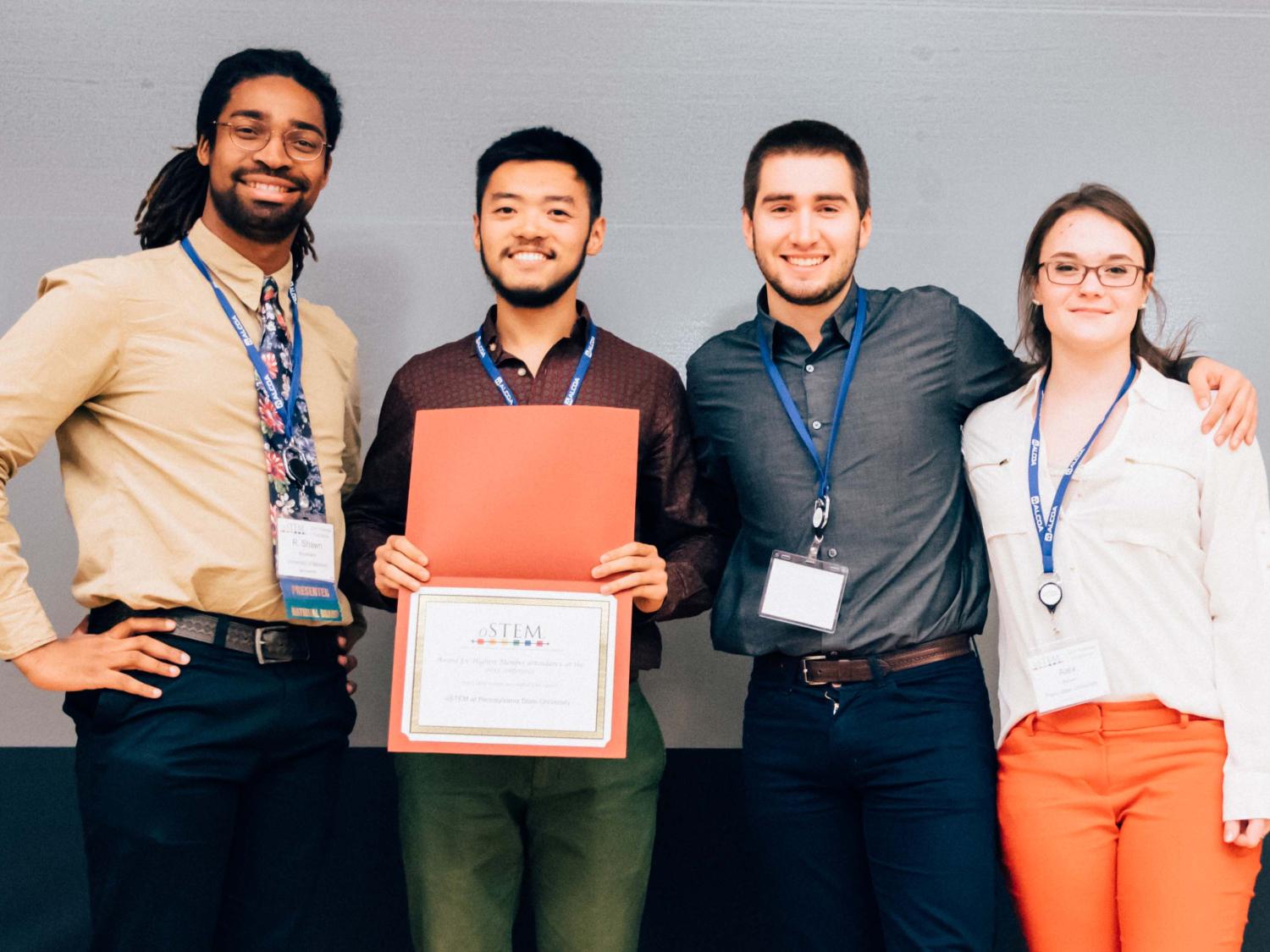 oSTEM members holding award