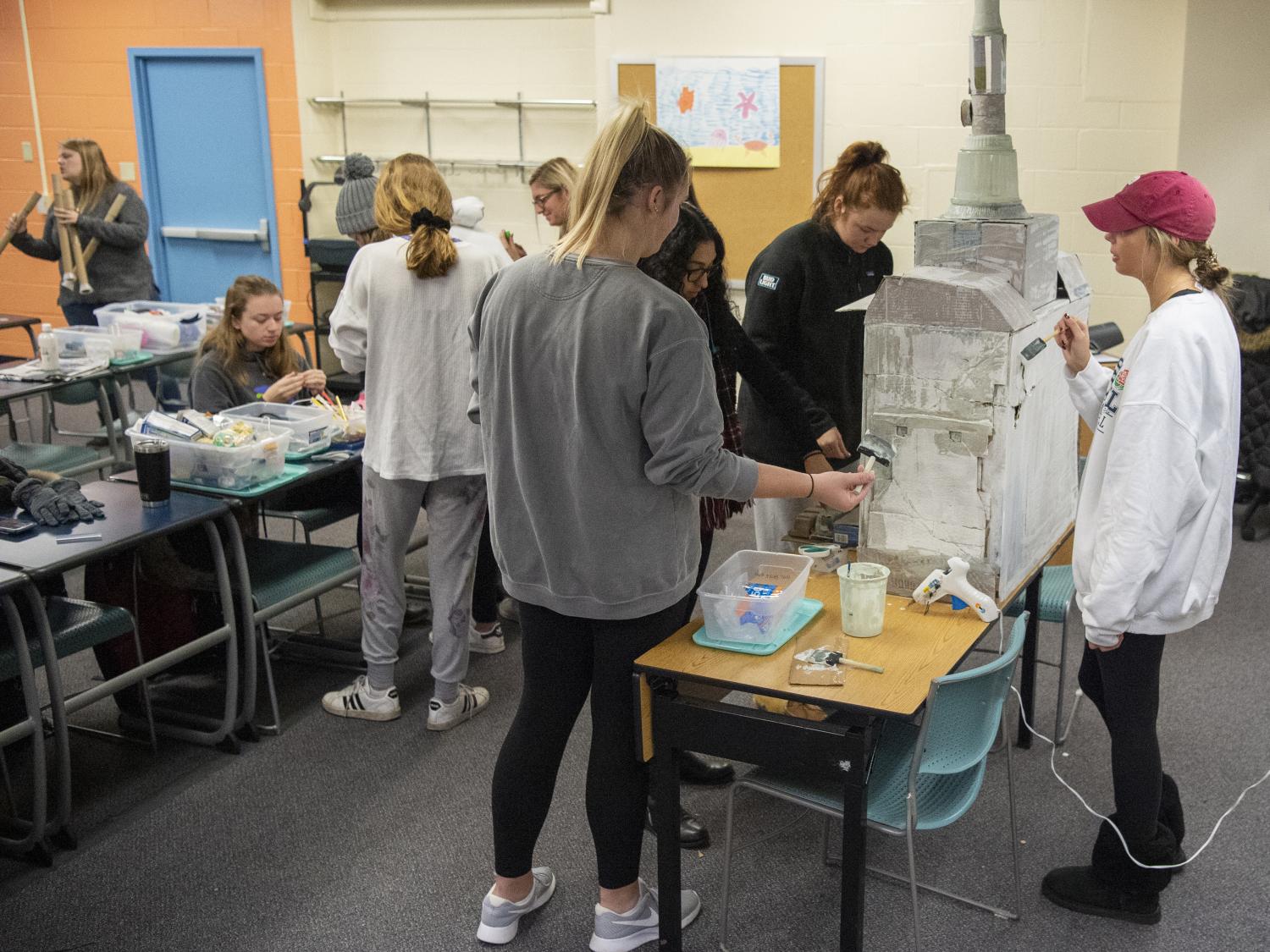 Students building Old Main replica