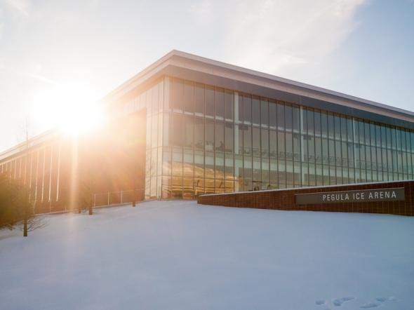 The sun shines on the Pegula Ice Arena